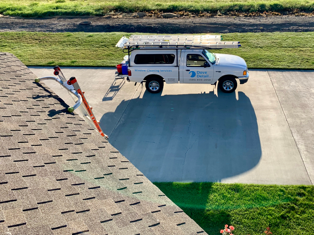 Truck and ladder set up for second story windows